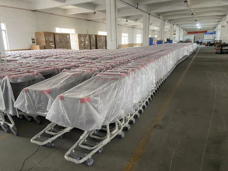 Batch of shopping carts wrapped and staged