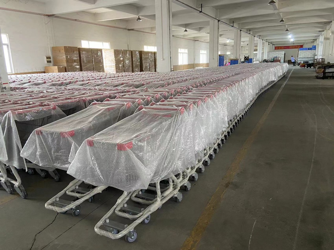 Batch of retail shopping carts prepared for shipment