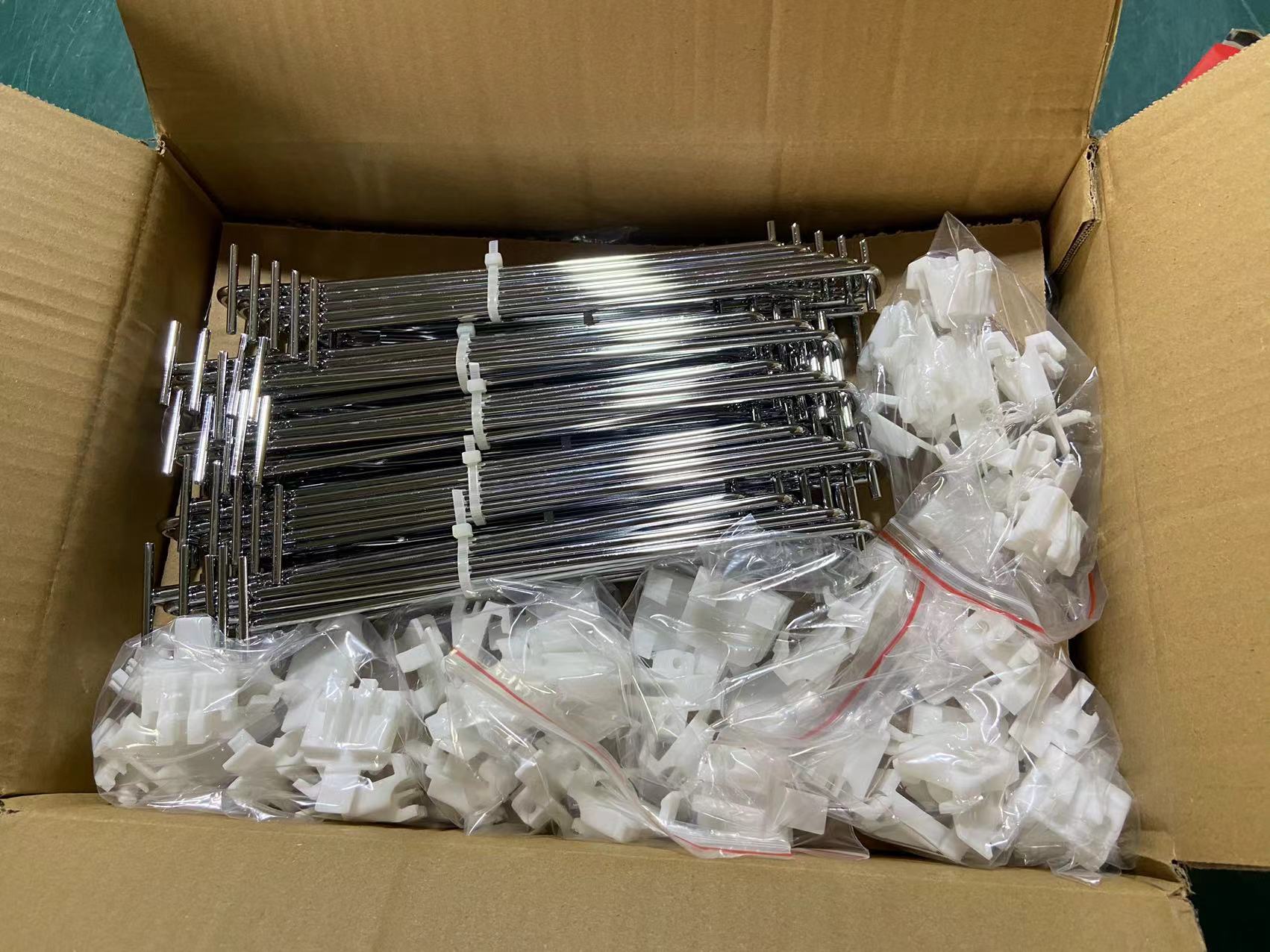 Packed metal hooks and plastic accessories