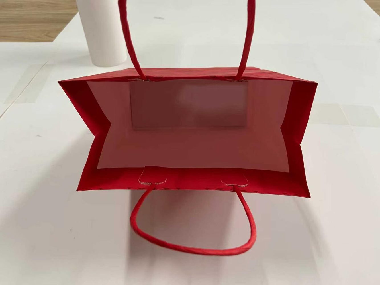 Custom paper bag interior and handle detail