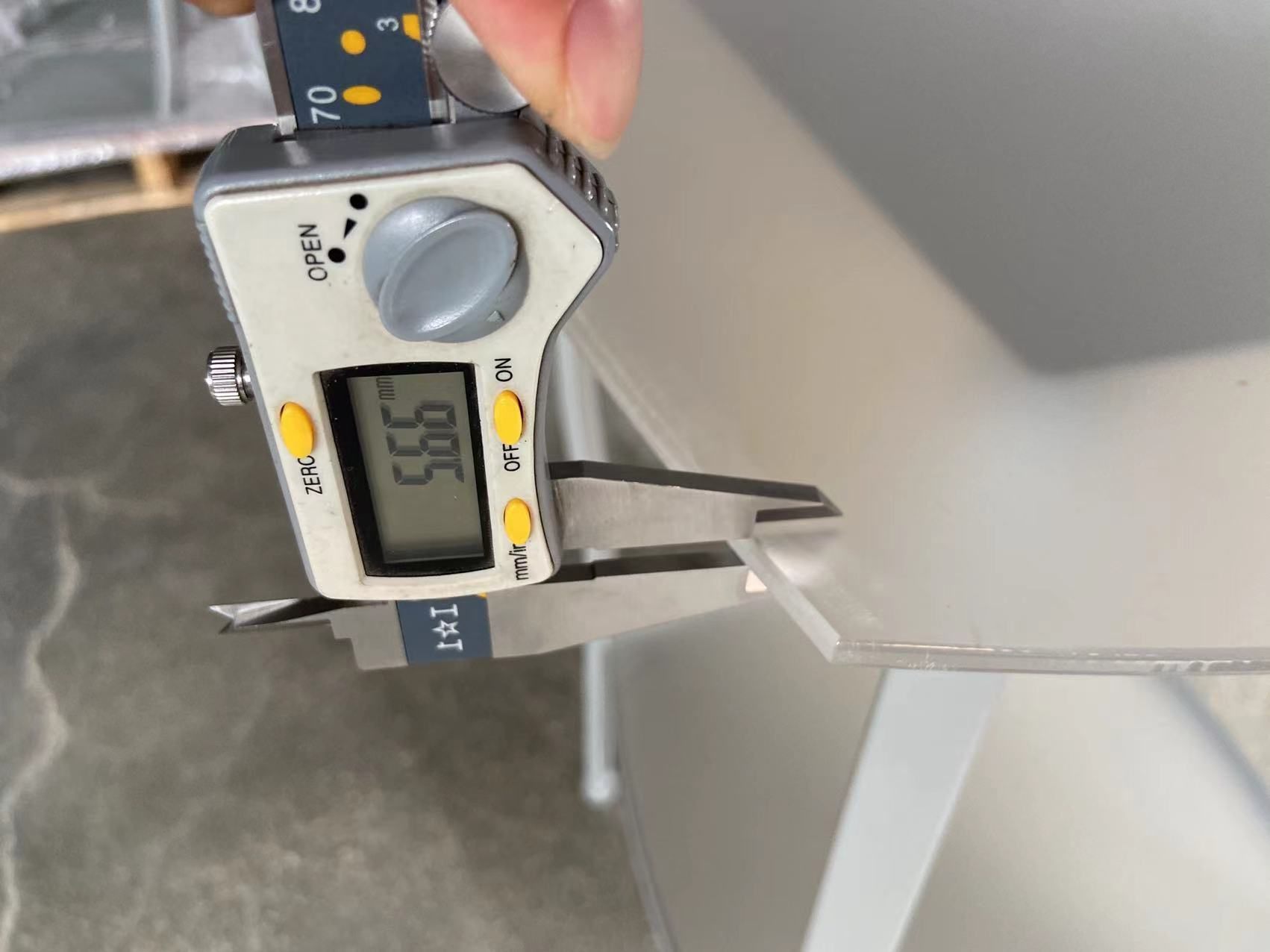 QC caliper measurement on a retail fixture component